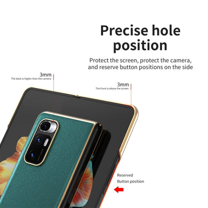 Teal leather-texture protective case with raised screen and precise side button cutouts