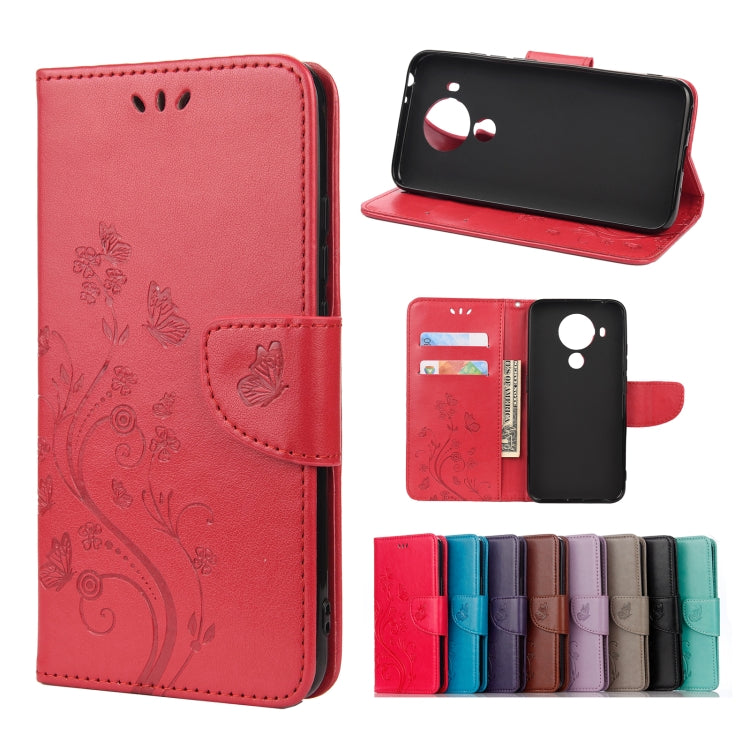 Red leather flip phone case with butterfly floral pattern, holder and card slots