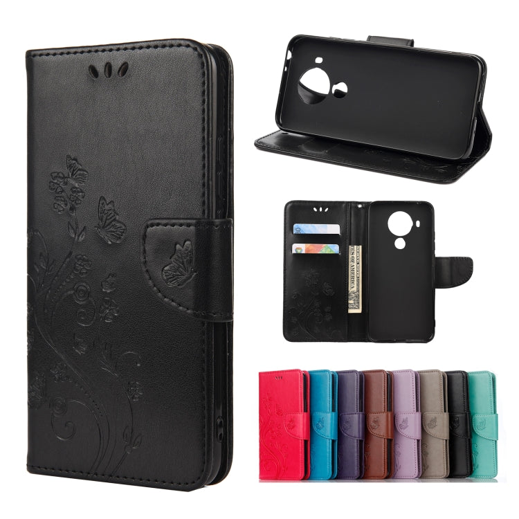 Black leather flip phone case with butterfly floral pattern, holder and card slots