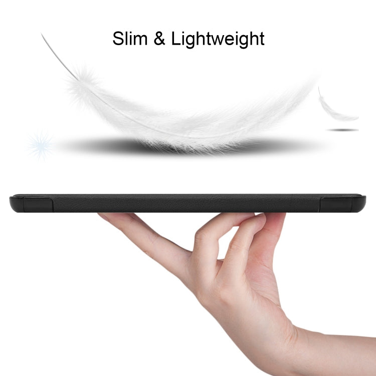 Thin black tablet case edge held in a hand