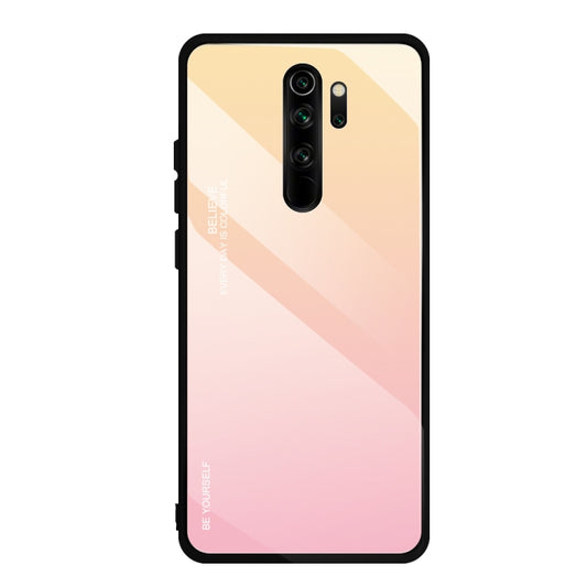 Gradient glass phone case with pink-to-peach finish, camera cutouts, and black bezel