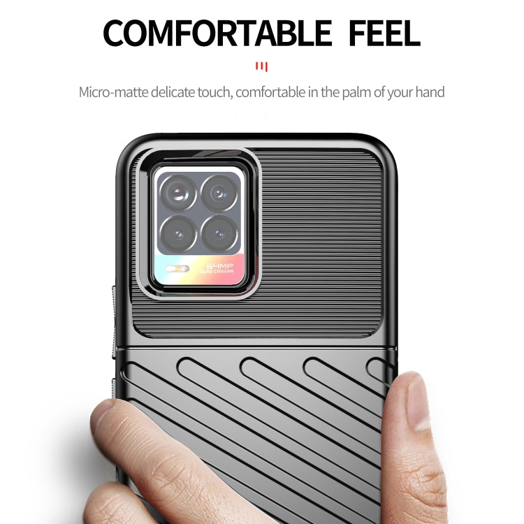 Dark TPU phone case with ribbed pattern, raised quad-camera cover, and side button cutouts
