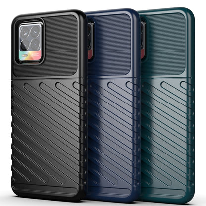 Three TPU phone cases in dark, blue, and teal with ribbed texture and camera cutouts