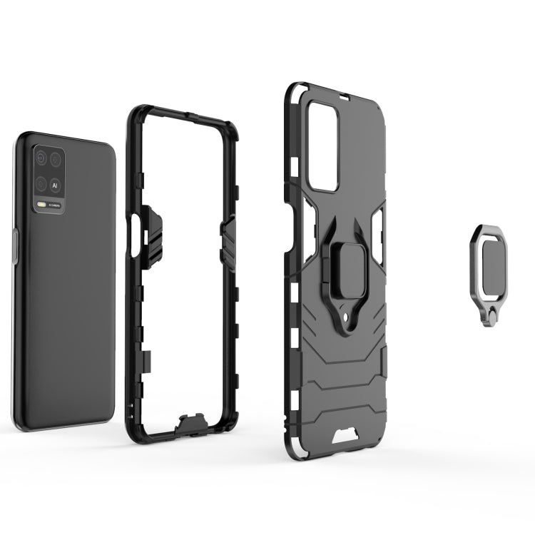 Shockproof phone case with magnetic ring holder, black rugged shell and accessory piece.