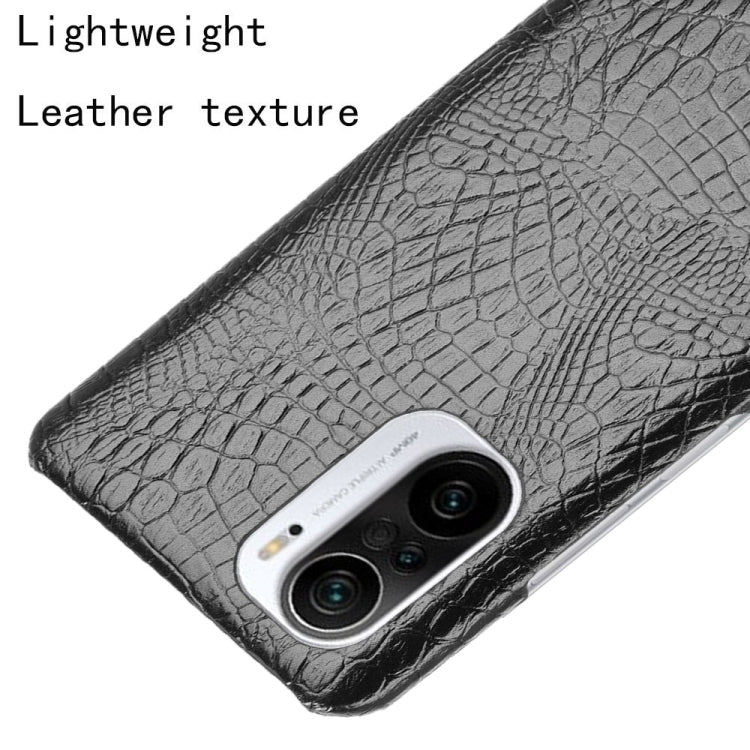 Black crocodile-texture phone case with visible camera module opening