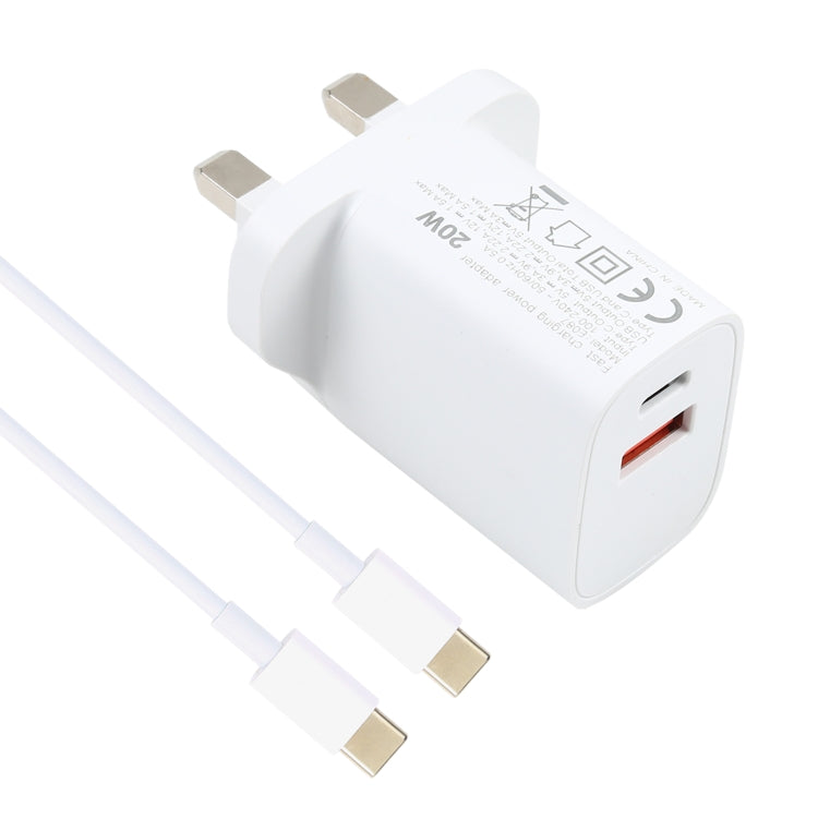 White dual-port USB charger with red USB-A port and white USB-C to USB-C cable, gold ends