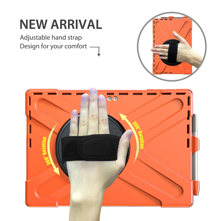 Orange shockproof tablet case with adjustable hand strap and black circular holder