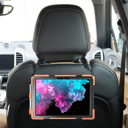 Orange tablet case with screen opening and black circular holder on a front car seat