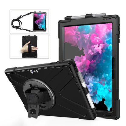 Black rugged tablet case with hand strap and circular kickstand holder for device protection