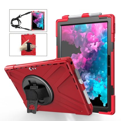 Red rugged tablet case with hand strap and circular kickstand holder for device protection