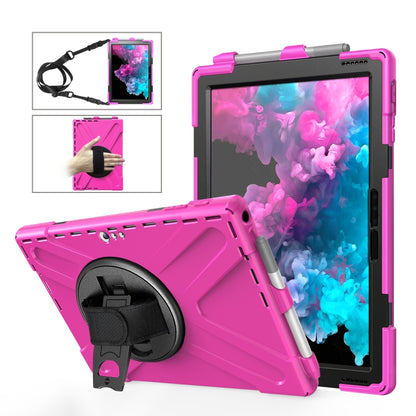 Magenta shockproof tablet case with kickstand, hand strap, and pen slot