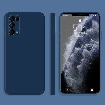 Navy blue silicone protective phone case with raised camera cutouts and side button openings