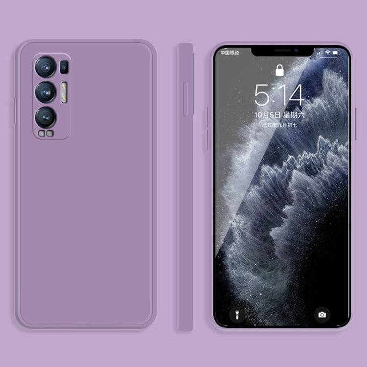 Purple liquid silicone phone case with raised edges and camera cutouts