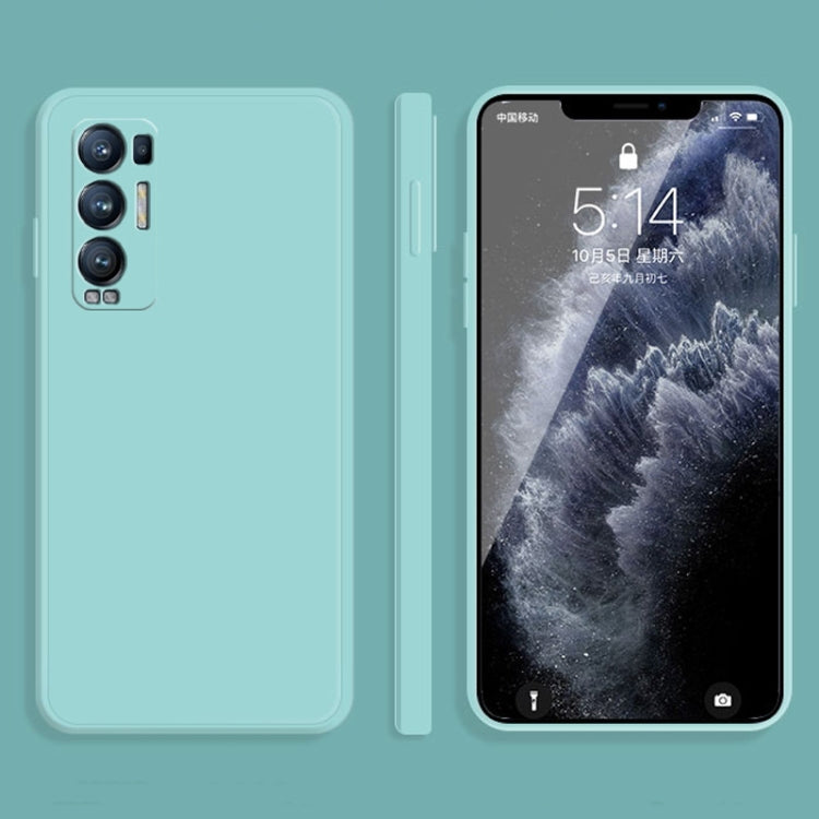 Light blue liquid silicone phone case with raised edges and camera cutouts