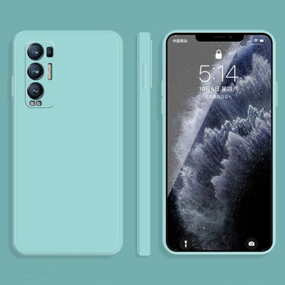 Light blue liquid silicone phone case with raised edges and camera cutouts