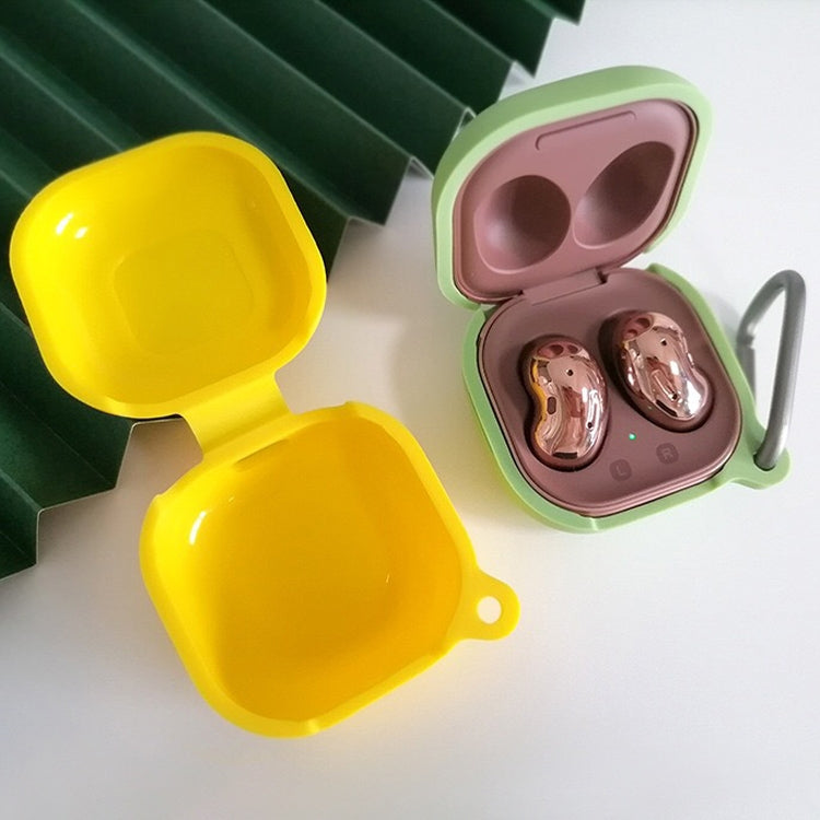 Yellow and green silicone earbud cases; green open with earbuds seated, yellow closed with loop.