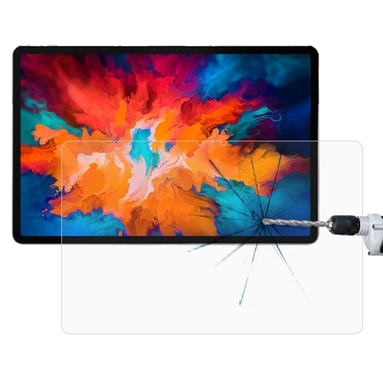 Transparent tempered glass screen protector on tablet, impact crack pattern visible