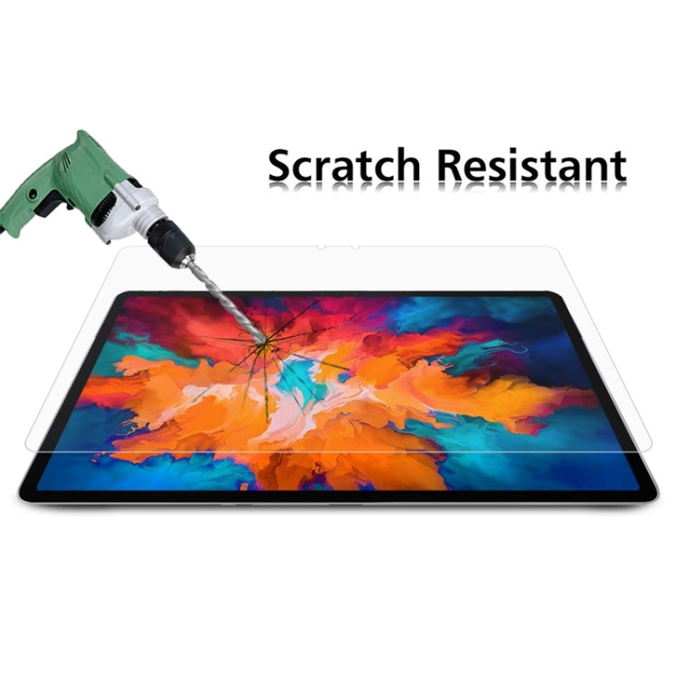 Transparent tempered glass screen protector on tablet after impact test, spiderweb cracks