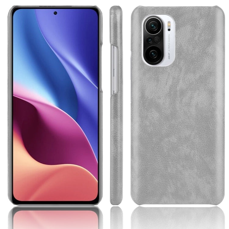 Light gray litchi-texture shockproof phone case with camera cutout
