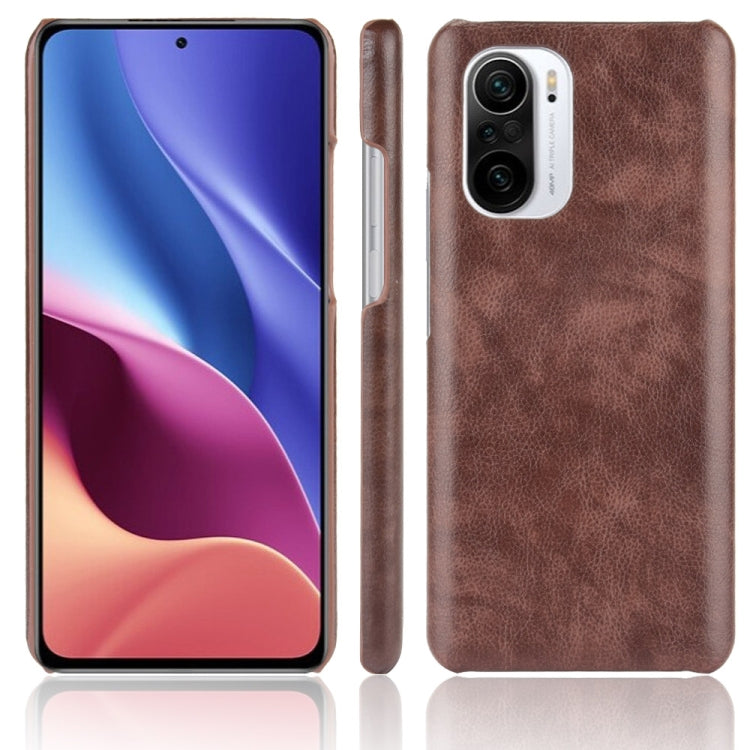 Brown litchi-texture shockproof phone case with camera cutout