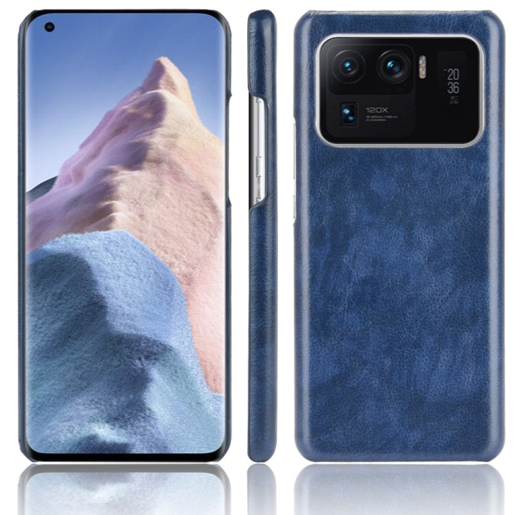 Shockproof phone case with litchi texture, blue dual-layer PC/PU, rear camera cutout
