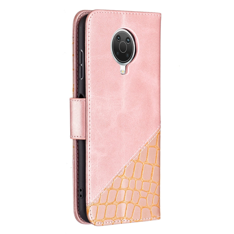 Rose gold PU leather phone case with crocodile texture panel and flip wallet strap.