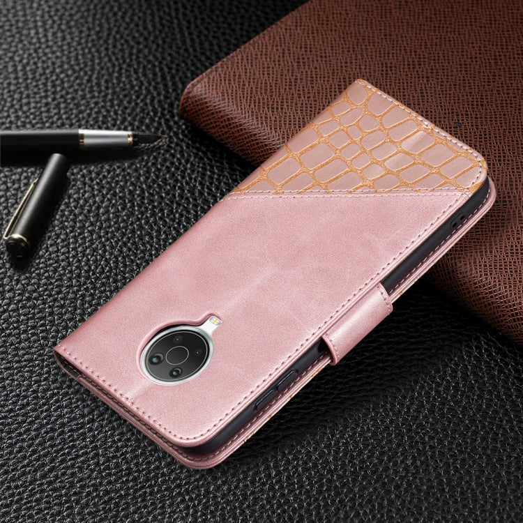 Rose gold PU leather flip wallet case with crocodile texture and camera cutout.