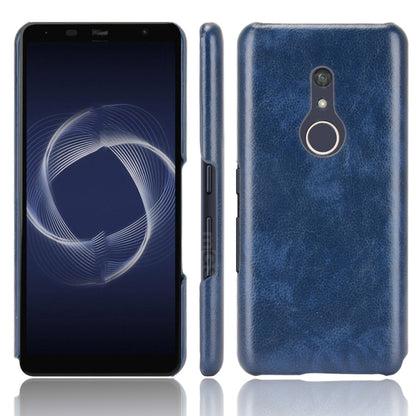 Shockproof litchi-textured PC+PU phone case with ring holder, blue back and side buttons