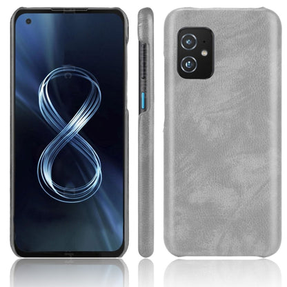 Shockproof litchi-textured PC+PU phone case with ring holder, grey back and ports