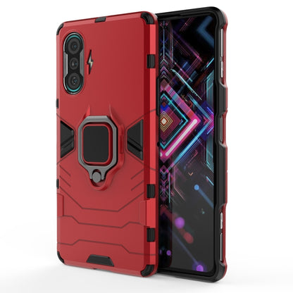 Shockproof phone case in red with magnetic ring stand and raised camera cutouts