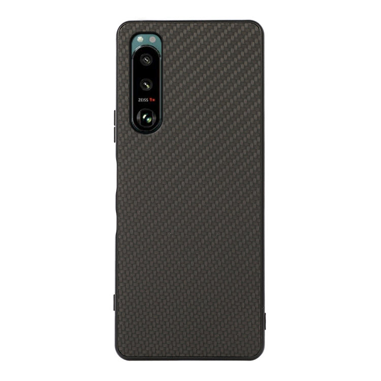 Protective phone case with carbon-fiber texture, dark gray, raised camera module