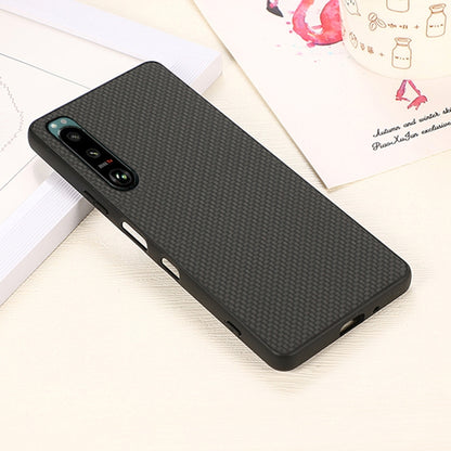 Slim protective phone case with carbon-fiber texture, black, side button and port openings