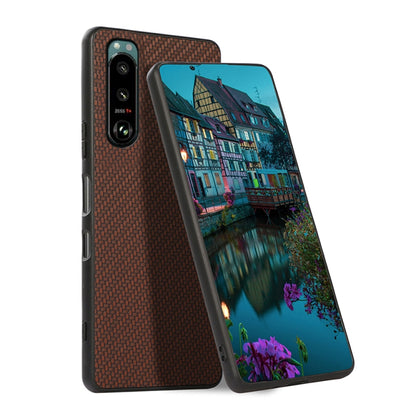 Protective phone case with carbon-fiber texture, brown, dual camera cutouts