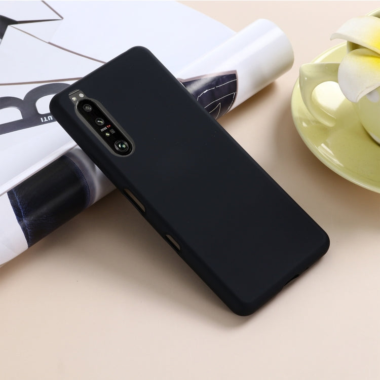 Black slim phone case with camera cutout and side openings