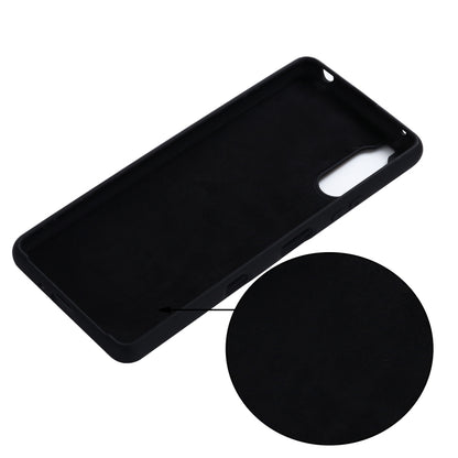 Black silicone phone case shell with camera opening and side cutouts