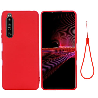 Red liquid silicone shockproof phone case with camera cutout and lanyard
