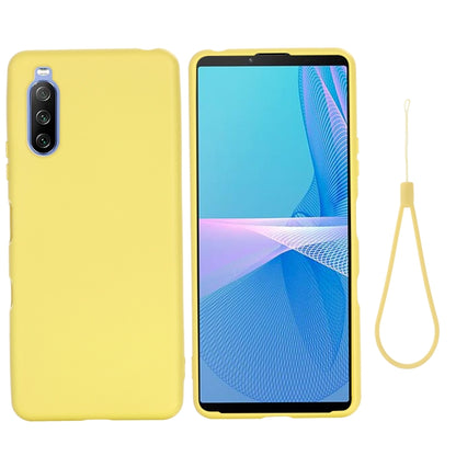 Yellow shockproof silicone phone case, full coverage with camera cutout and lanyard loop