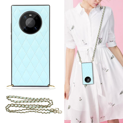 Light blue quilted diamond phone case with crossbody chain strap and TPU shock protection