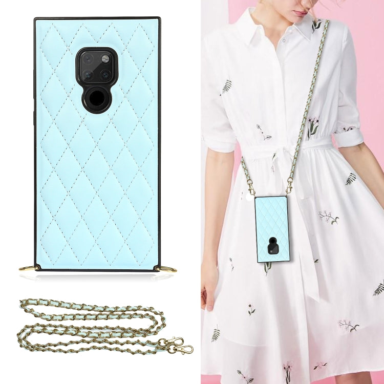 Light blue quilted diamond phone case with crossbody chain strap and camera cutouts
