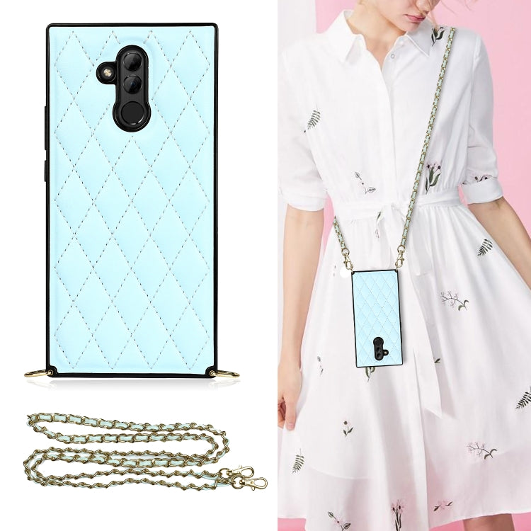 Light blue quilted diamond phone case with crossbody chain strap and raised camera bezel