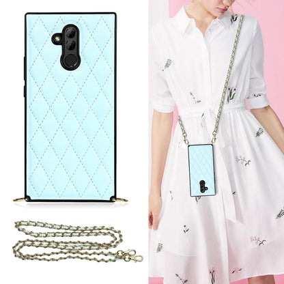Light blue quilted diamond phone case with crossbody chain strap and raised camera bezel