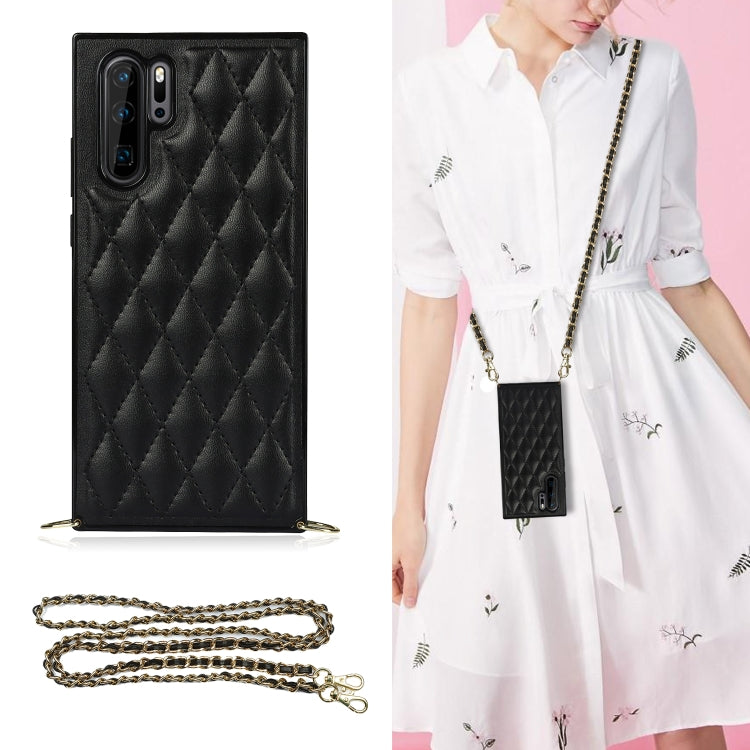 Microfiber leather phone case in black with quilted rhombus texture, camera cutouts, chain strap