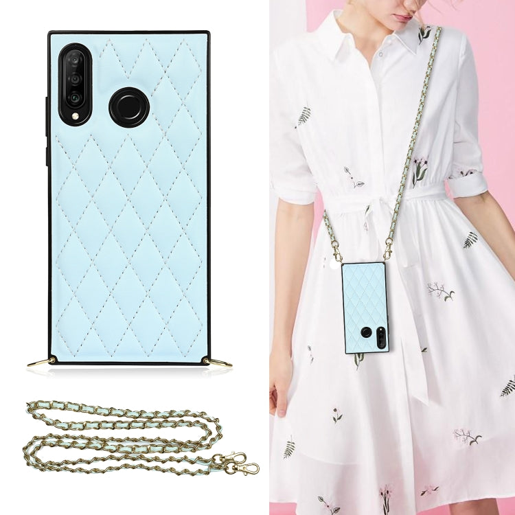 Light blue quilted diamond phone case with crossbody chain strap and wide camera opening