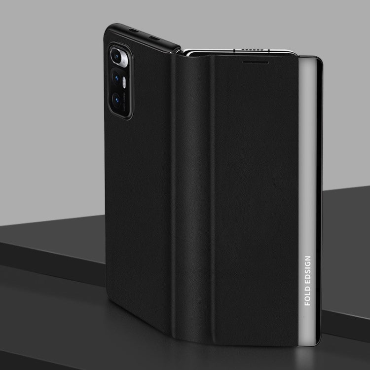 Matte black folding leather case for a foldable smartphone, with card-slot cutout detail