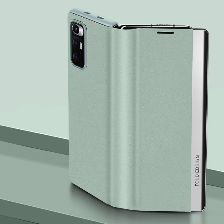 Matte green folding leather case for a foldable smartphone, with camera cutout