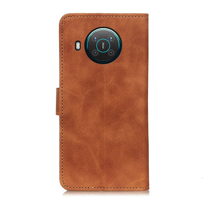 Brown flip phone wallet case with visible camera cutout on the back