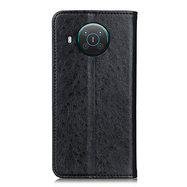 Black leather flip phone case with camera cutout and button openings