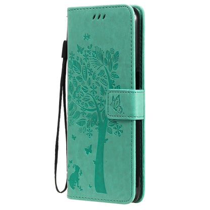 Green PU leather flip phone case with tree & cat pattern, side view with strap
