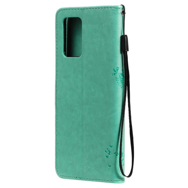 Green PU leather phone case back with cutout and tree & cat pattern; lanyard strap