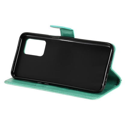 Green PU leather flip phone case with stand support; tree & cat pattern on cover
